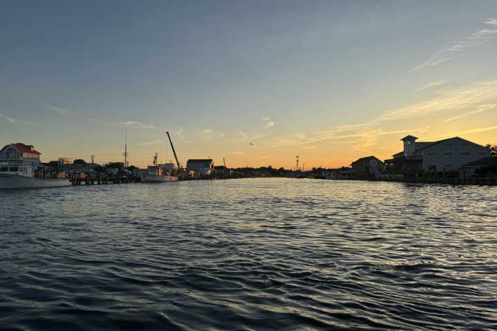 a sunset over a body of water