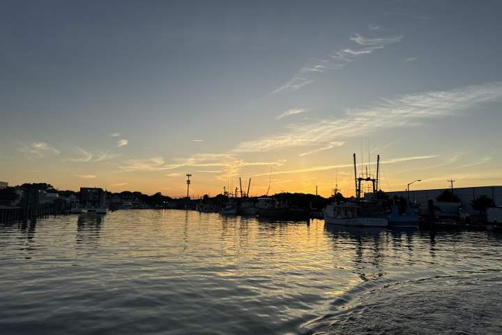 a sunset over a body of water