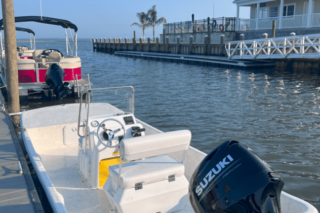 a boat that is sitting on a motorcycle