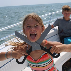 a person sitting on a boat in the water