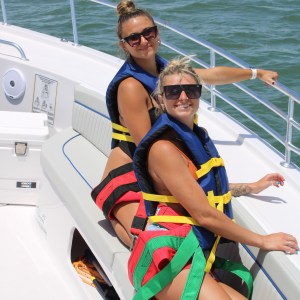 a person sitting on a boat in the water
