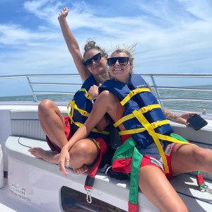 a couple of people that are sitting on a boat