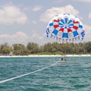 a parachute with a body of water