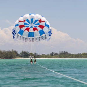 a parachute with a body of water