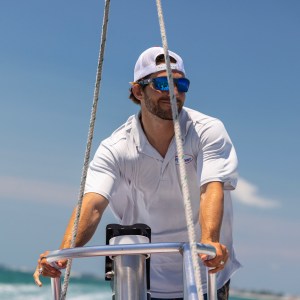 a man riding on the back of a boat