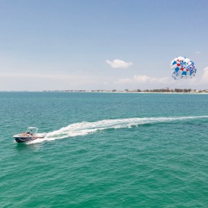 a ship in a body of water next to the ocean