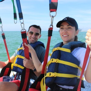 a group of people on a boat in the water