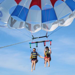 a group of people on a parachute