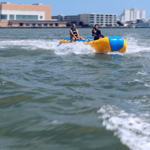 a man riding a wave on a surfboard in the water