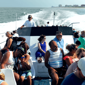 a group of people on a boat in the water