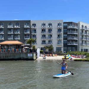 a group of people in a boat on a body of water