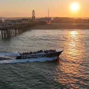 a close up of a pier next to a body of water