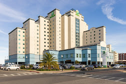 a city with tall buildings in a parking lot