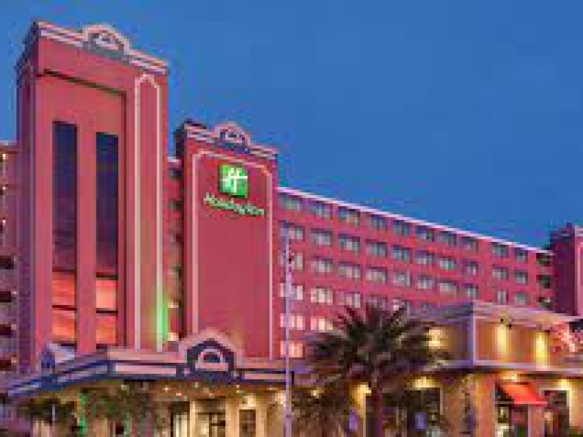 a large clock tower towering over a city