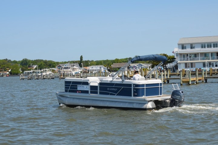 a small boat in a large body of water