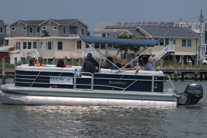 a small boat in a large body of water