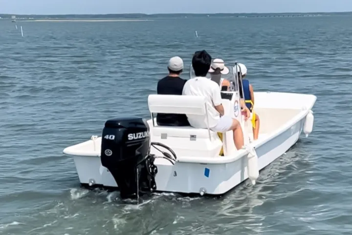 a small boat in a body of water