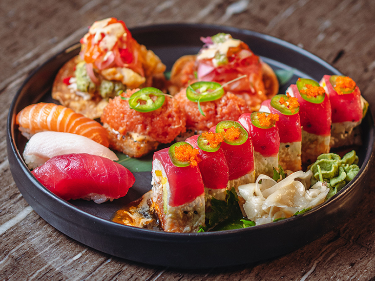 a plate of food on a wooden table