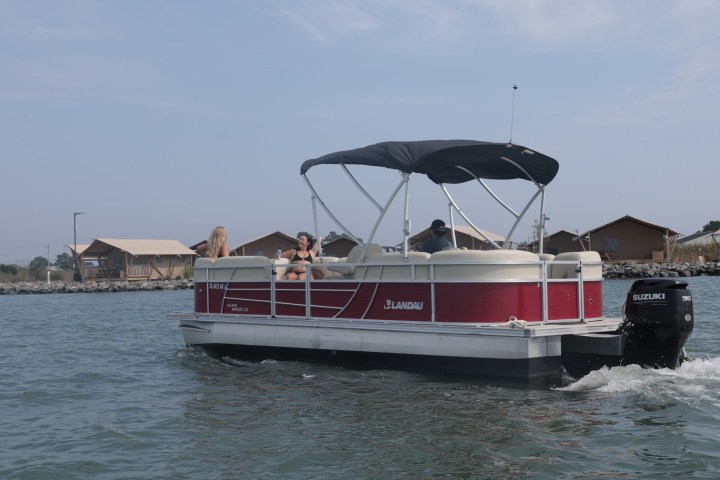 a small boat in a large body of water