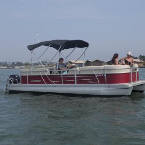 a small boat in a body of water