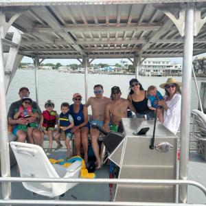a group of people on a boat