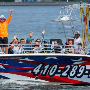 a group of people on a boat in a body of water