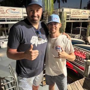 a person standing in front of a bus
