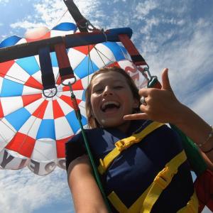 a person holding a colorful umbrella