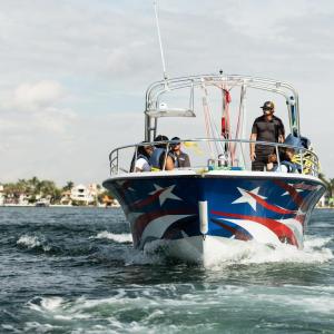 a small boat in a body of water