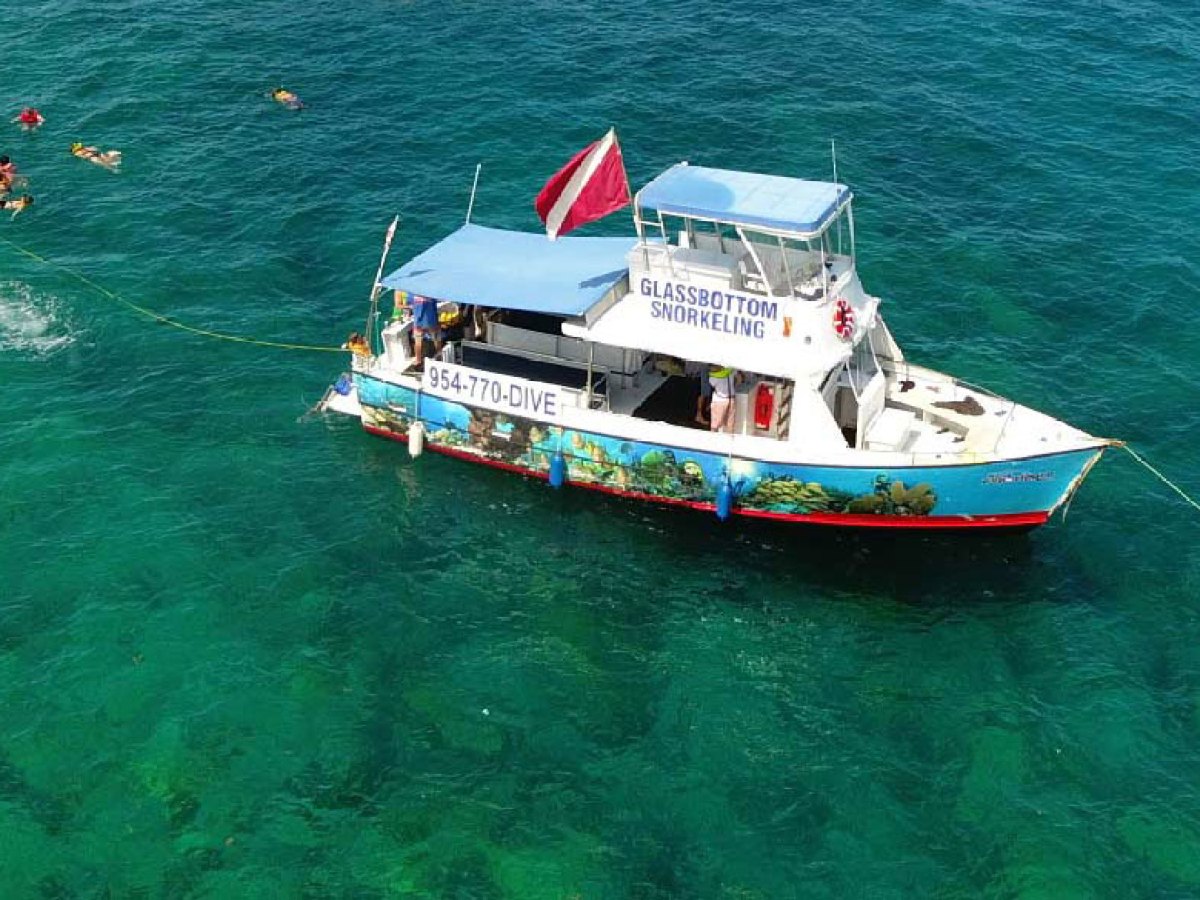 a small boat in a large body of water