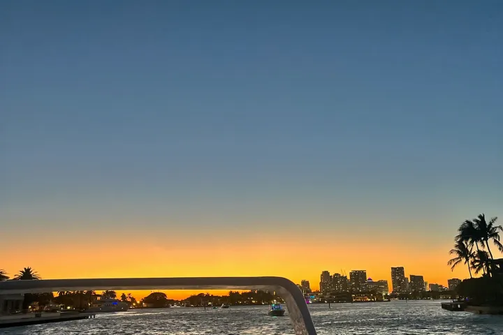 a sunset over a body of water