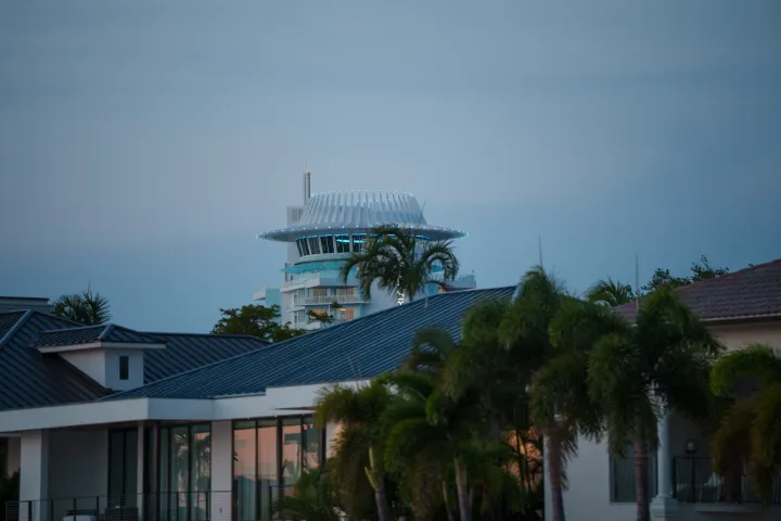 a building with palm trees
