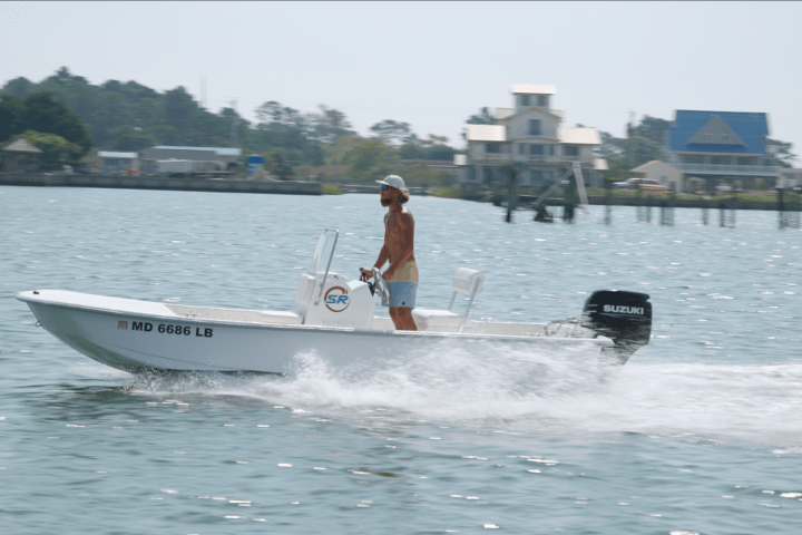 a small boat in a body of water