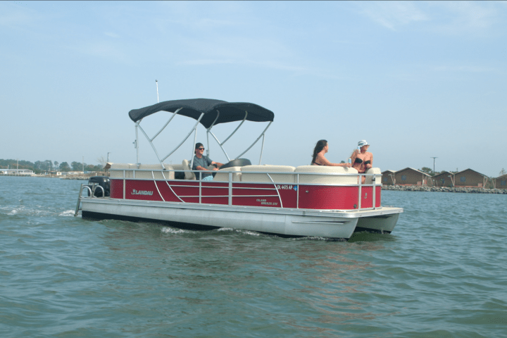 a small boat in a large body of water