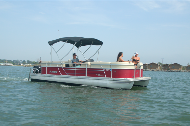 a small boat in a large body of water