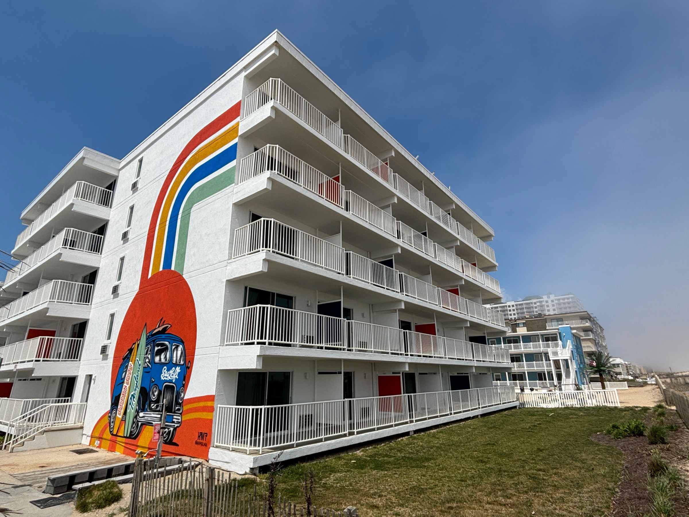 a sign in front of a building