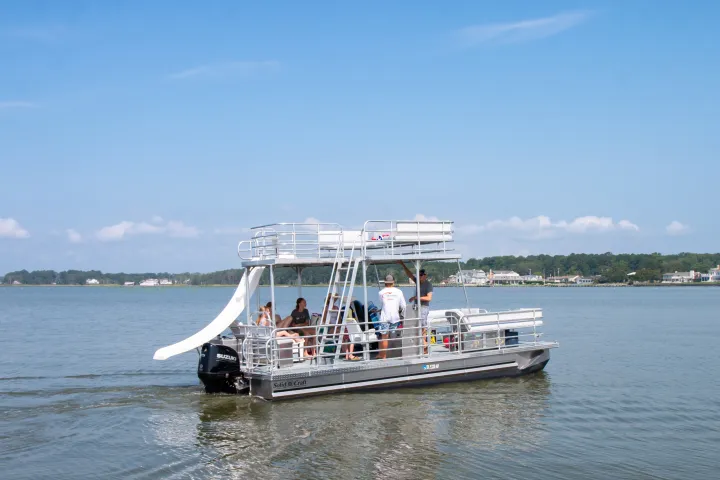 a small boat in a large body of water