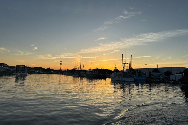 a sunset over a body of water