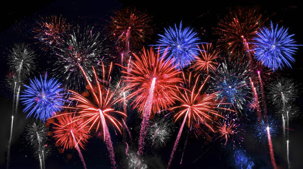 fireworks in the palm of a christmas tree