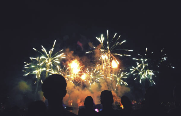a group of fireworks in a dark room