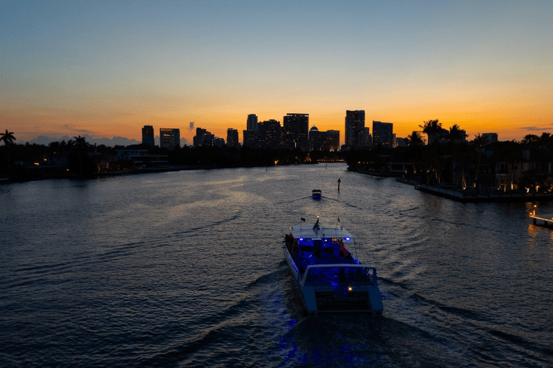 Sea Rocket Speed Boat cruising on the water during the sunset.”