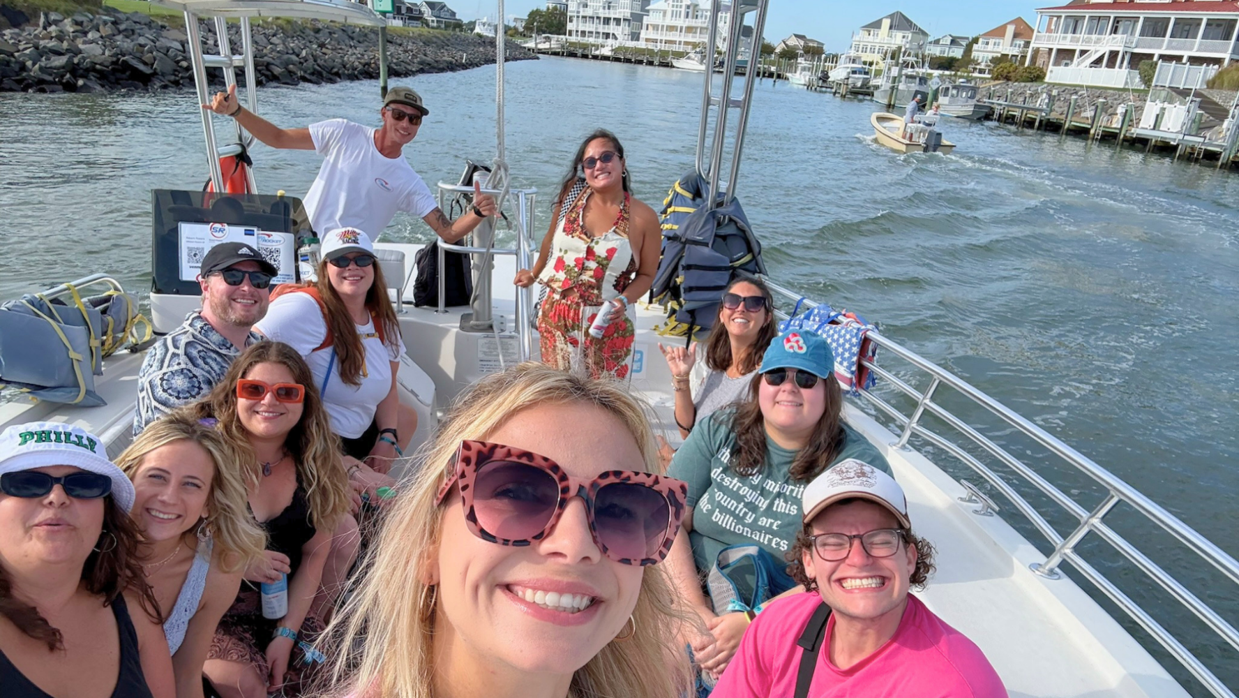 Group of friends enjoying a private 12-passenger sunset cruise with Sea Rocket in Ocean City MD