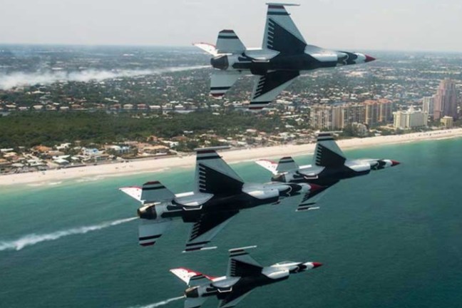 U.S. Air Force Thunderbirds performing at the Fort Lauderdale Air Show with ocean below